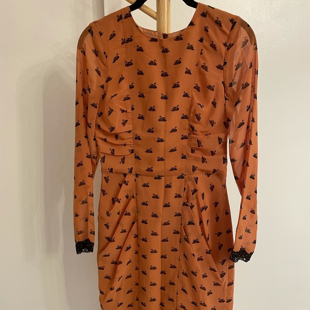 ASOS black and orange swan print dress.